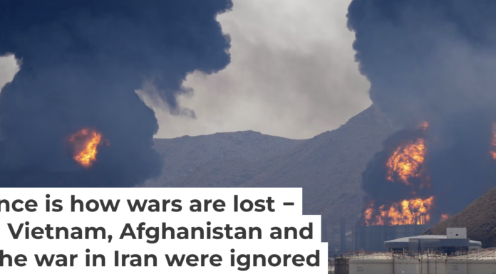 Plumes of smoke and fire rise after debris from an intercepted Iranian drone struck an oil facility, according to authorities, in Fujairah, United Arab Emirates, on March 14, 2026. AP Photo/Altaf Qadri